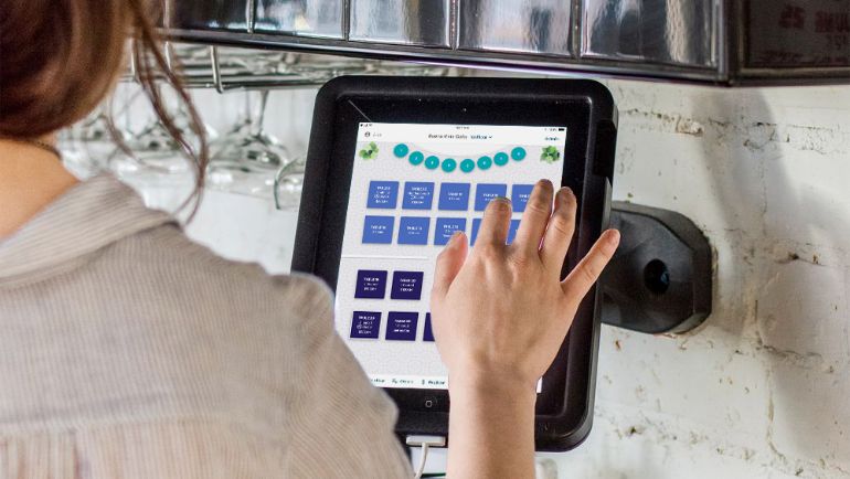 TouchBistro iPad point of sale with floor plan screen