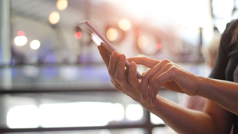 Closeup of a person using a smartphone